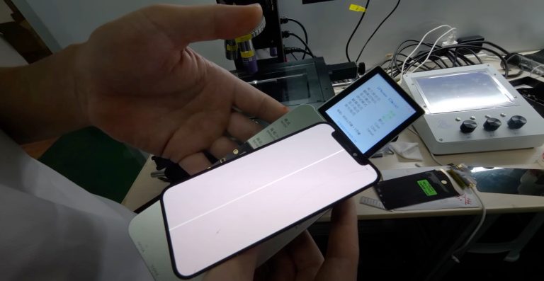A laser machine can repair lines that can appear on OLED panels like the iPhone's.