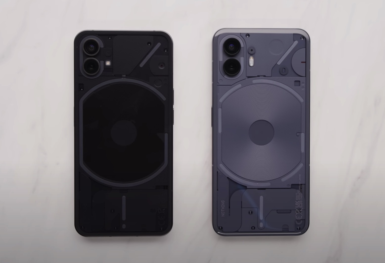 Nothing Phone (1) (left) vs. Nothing Phone (2) (right): The new LED glyph system.