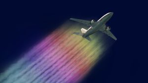 rainbow contrails behind airplane