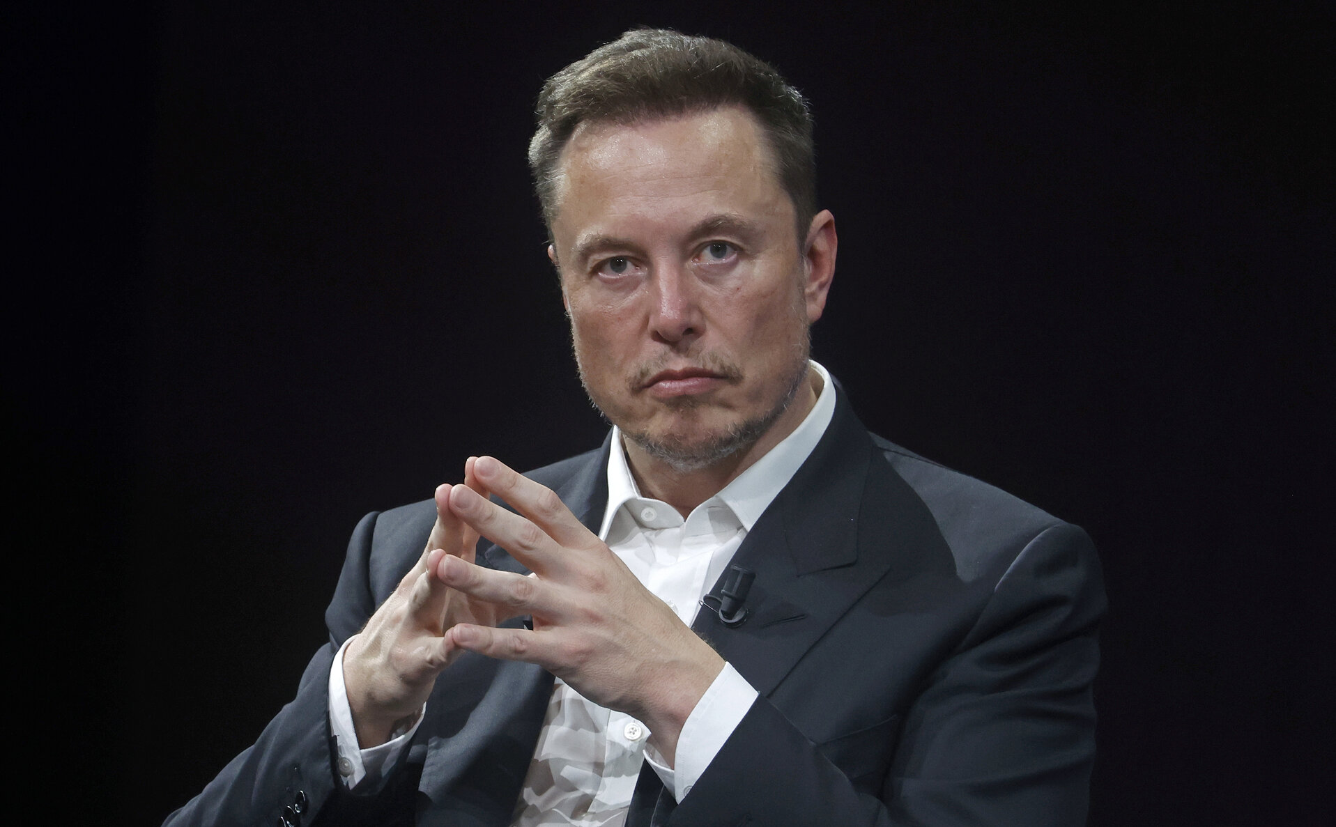 Elon Musk says AI will create ‘universal high income’ and eliminate the