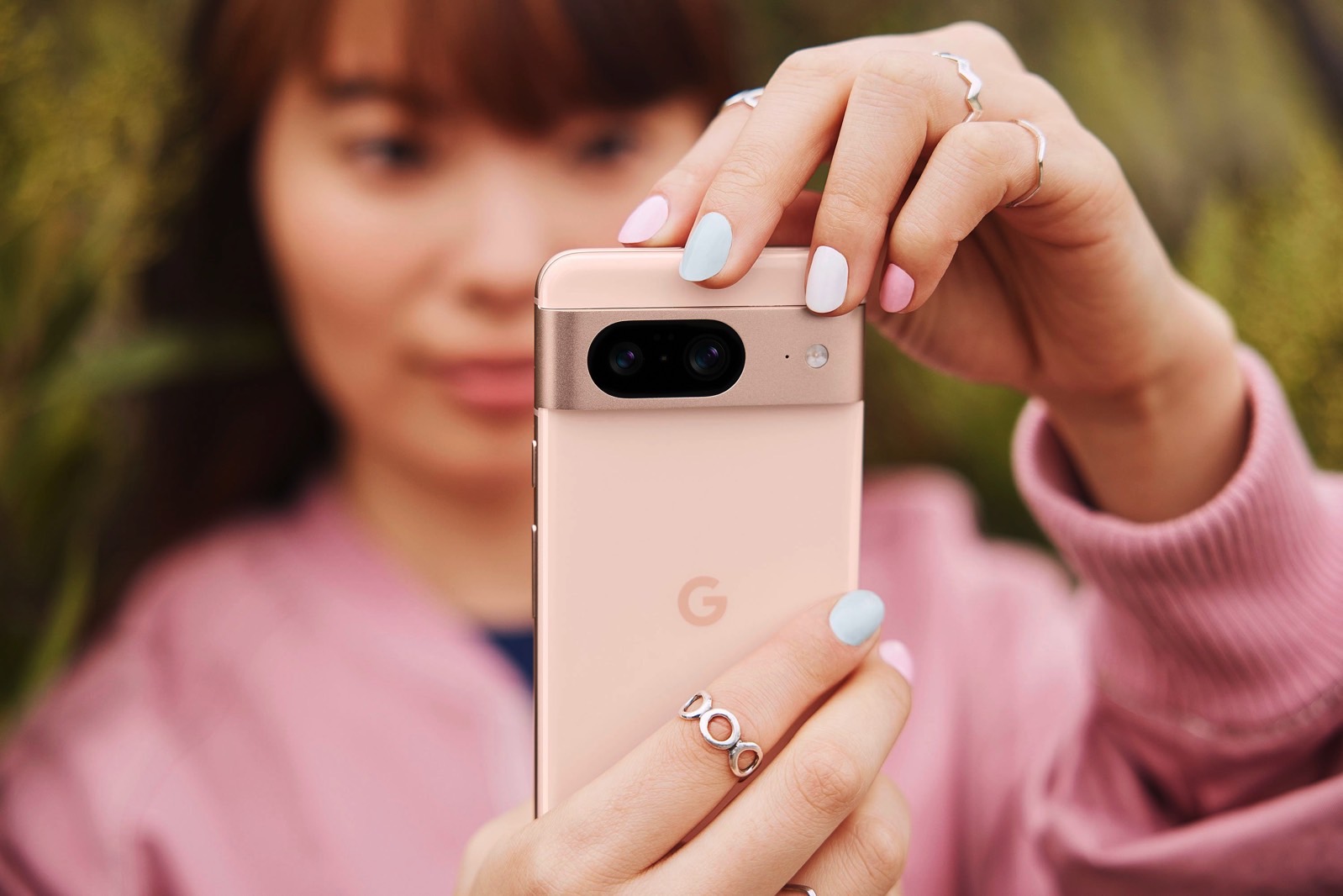 A person taking photos with the Pixel 8 cameras.