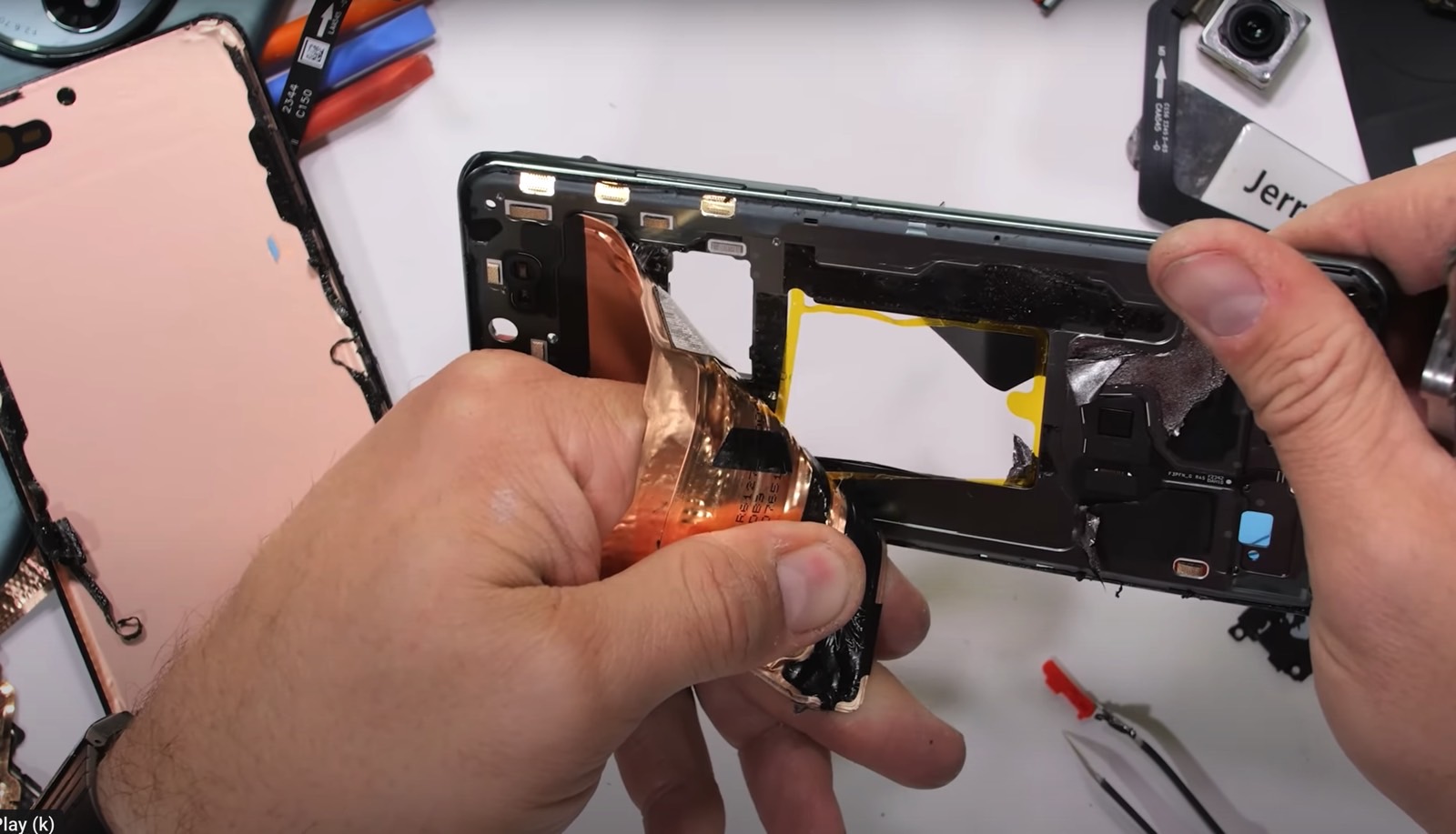 Removing the cooling system from the OnePlus 12.