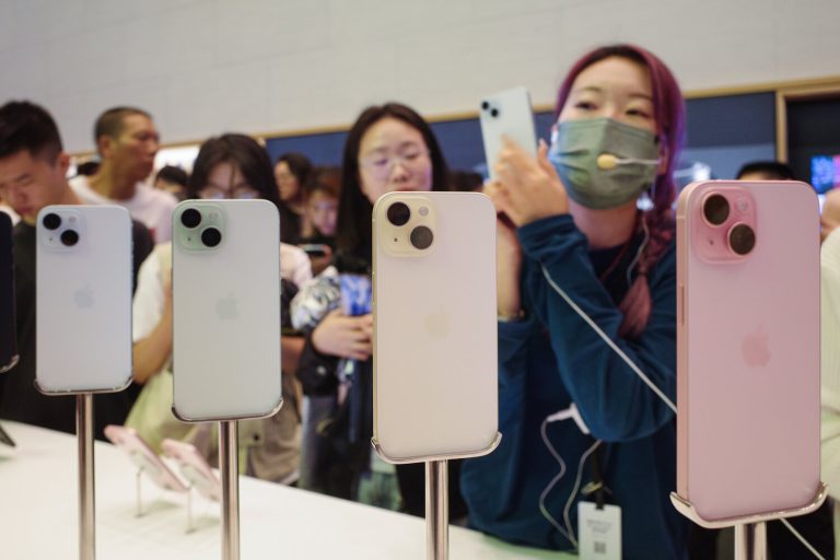 Apple customers in an Apple Store