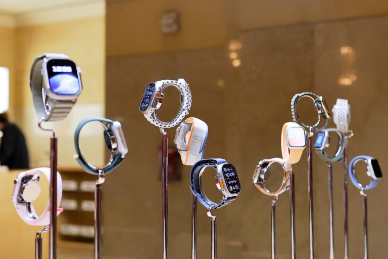 Apple Watches displayed in the Apple Store.