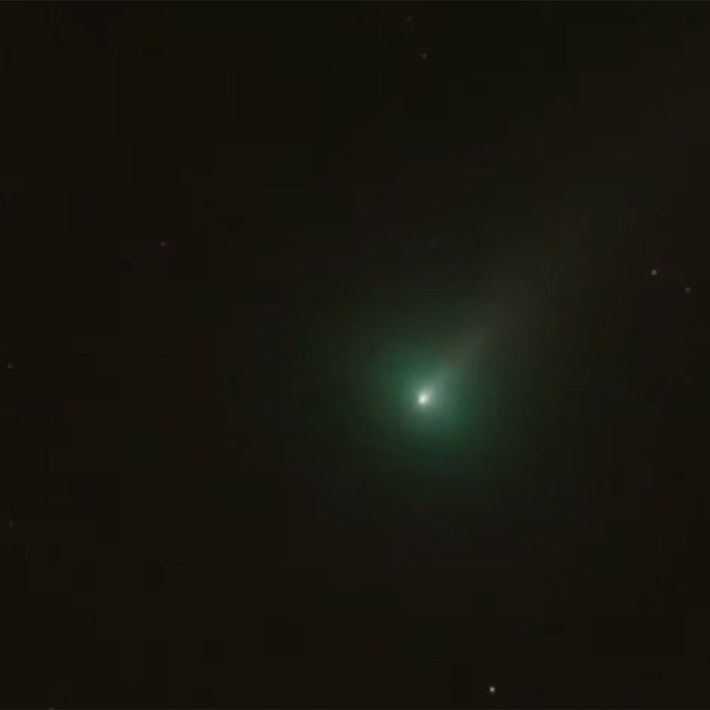 Watch the exploding green 'devil comet' zoom past the Andromeda