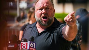 Alex Jones speaks to the media