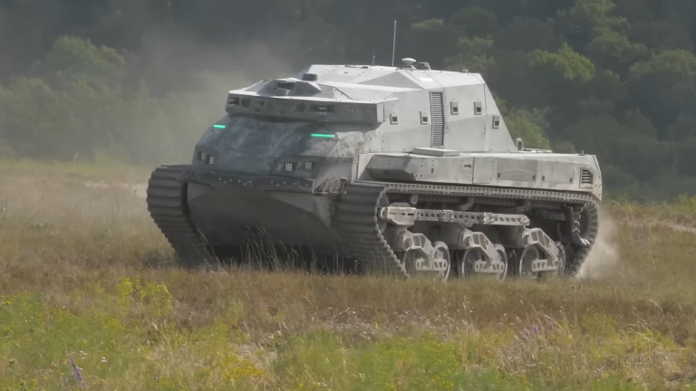 DARPA is testing massive autonomous robot tanks with glowing green eyes