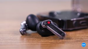 Nothing Ear Review Nothing Ear earbuds on a wooden table