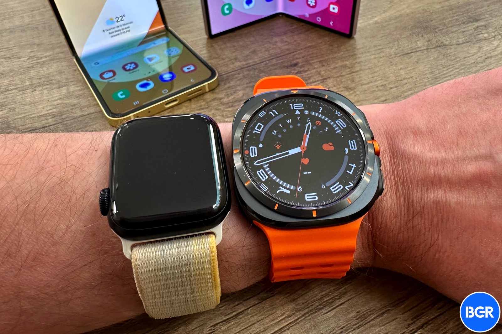 Galaxy Watch Ultra next to Apple Watch SE 2.
