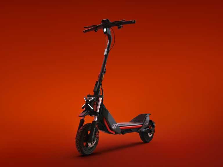 Segway's new ZT3 Pro escooter on a red background.