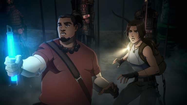 Earl Baylon as Jonah Maiava and Hayley Atwell as Lara Croft in Tomb Raider: The Legend of Lara Croft.