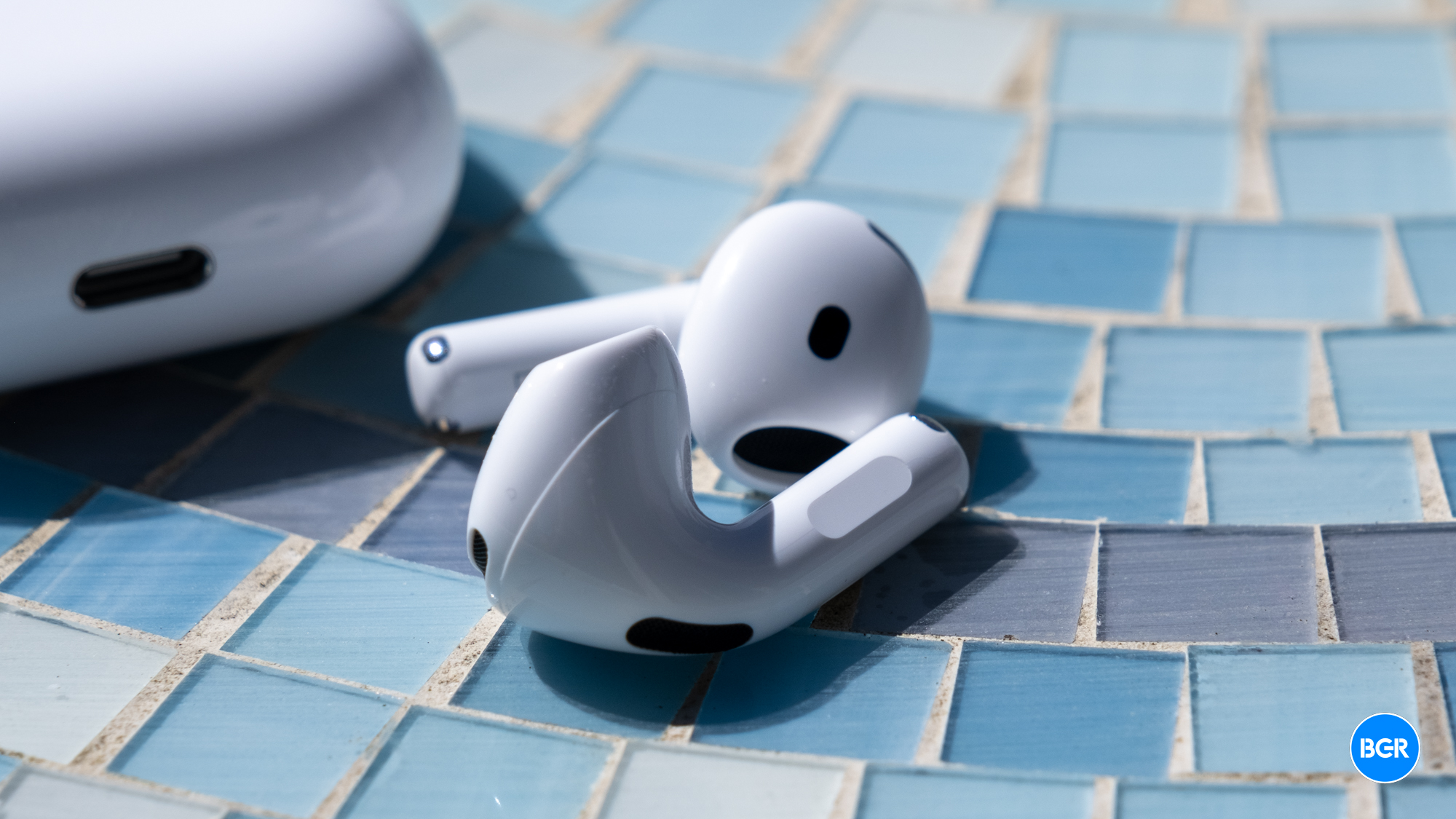 AirPods 4 earbuds on a table