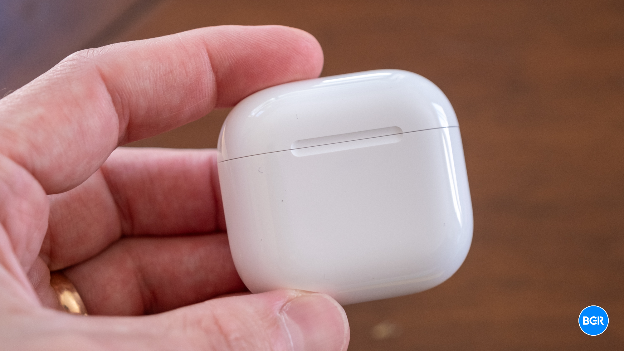 AirPods 4 with Active Noise Cancellation case in hand