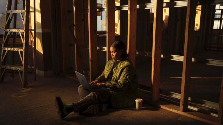 A person using the M4 MacBook Pro.