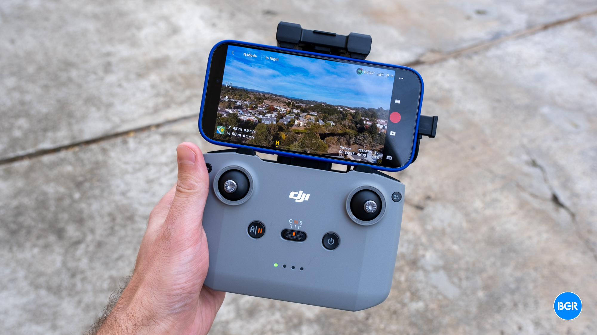 DJI Neo controller in hand