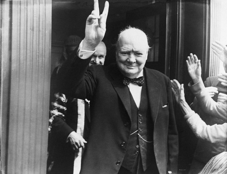 Winston Churchill, showing making a V-sign