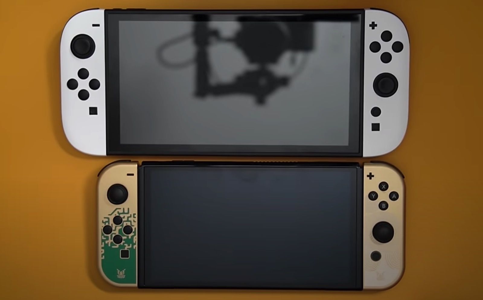 Nintendo Switch 2 dummy (above) and OLED Switch (below).