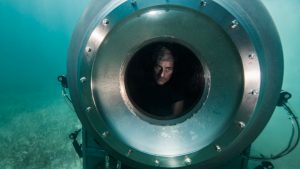 Netflix documentaries Image taken underwater of Stockton Rush testing Titan submersible.