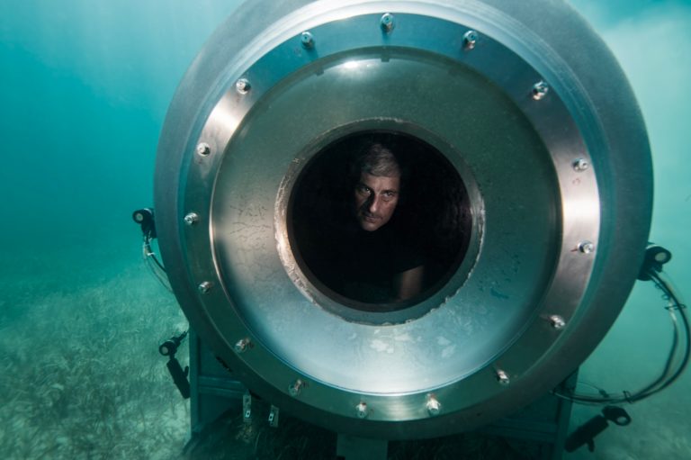 Image taken underwater of Stockton Rush testing Titan submersible.