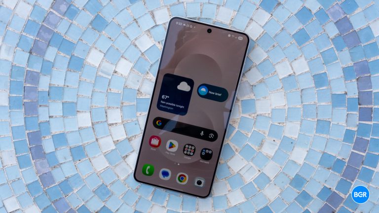 Front of the Samsung Galaxy S25 Edge on a blue table.