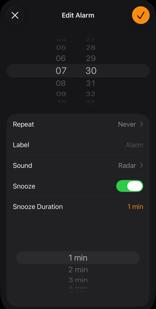 Changing the snooze time in iOS 26: Regular alarm.