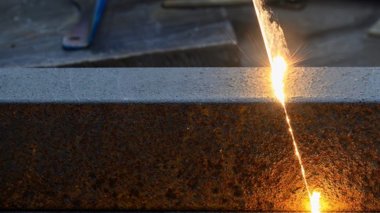 laser cutting through metal