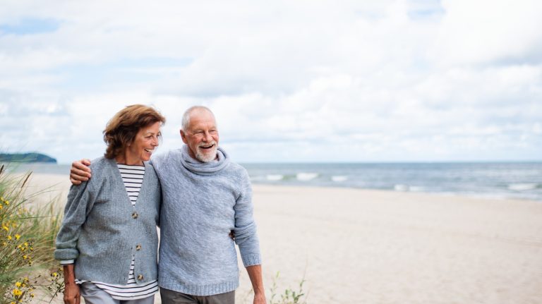 old man and woman walking