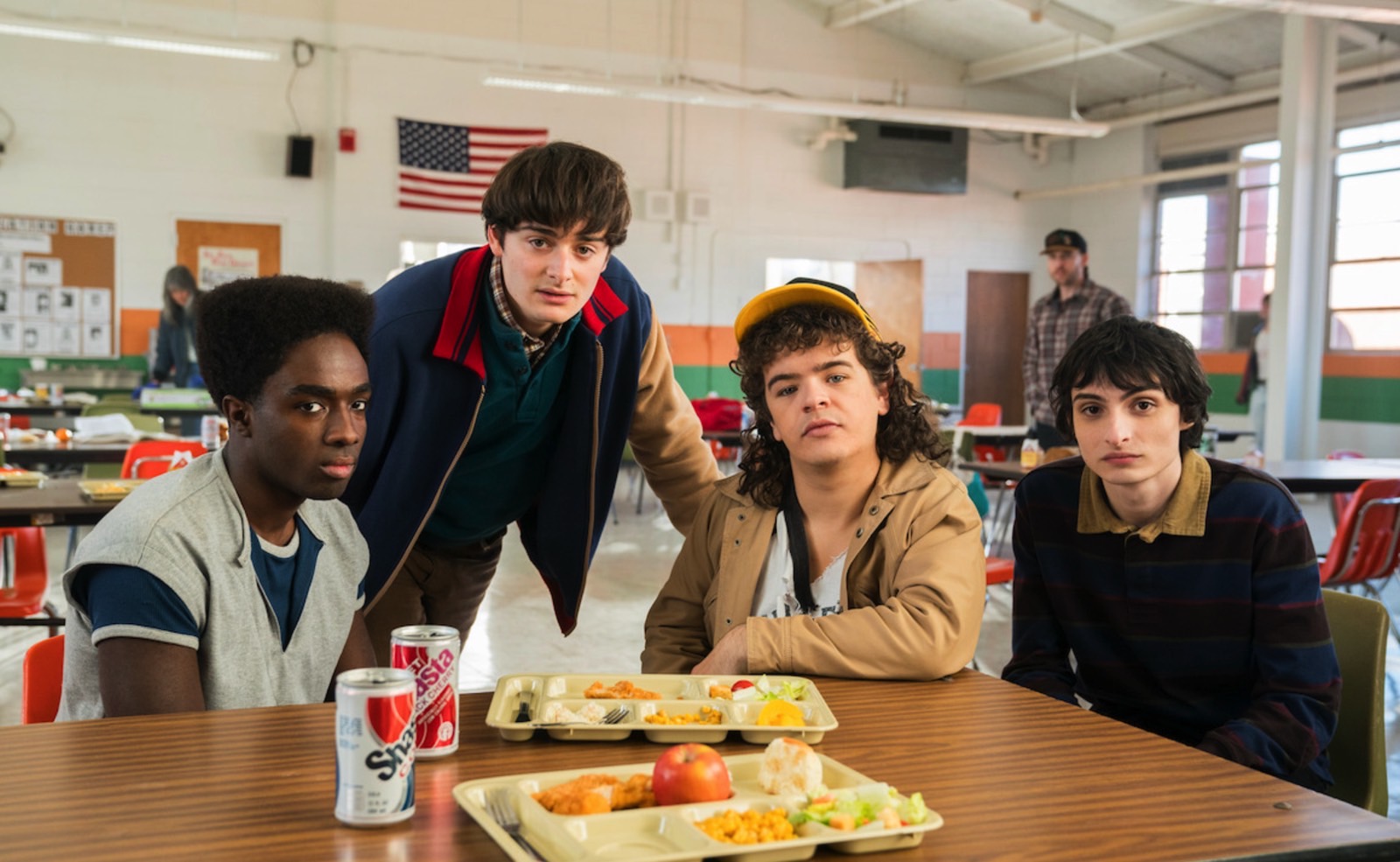 Lucas Sinclair (Caleb McLaughlin), Will Byers (Noah Schnapp), Dustin Henderson (Gaten Matarazzo), and Mike Wheeler (Finn Wolfhard) in a Stranger Things season 5 BTS photo.