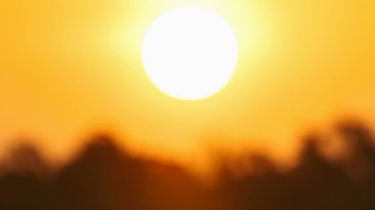 sun and heat boiling down on planet