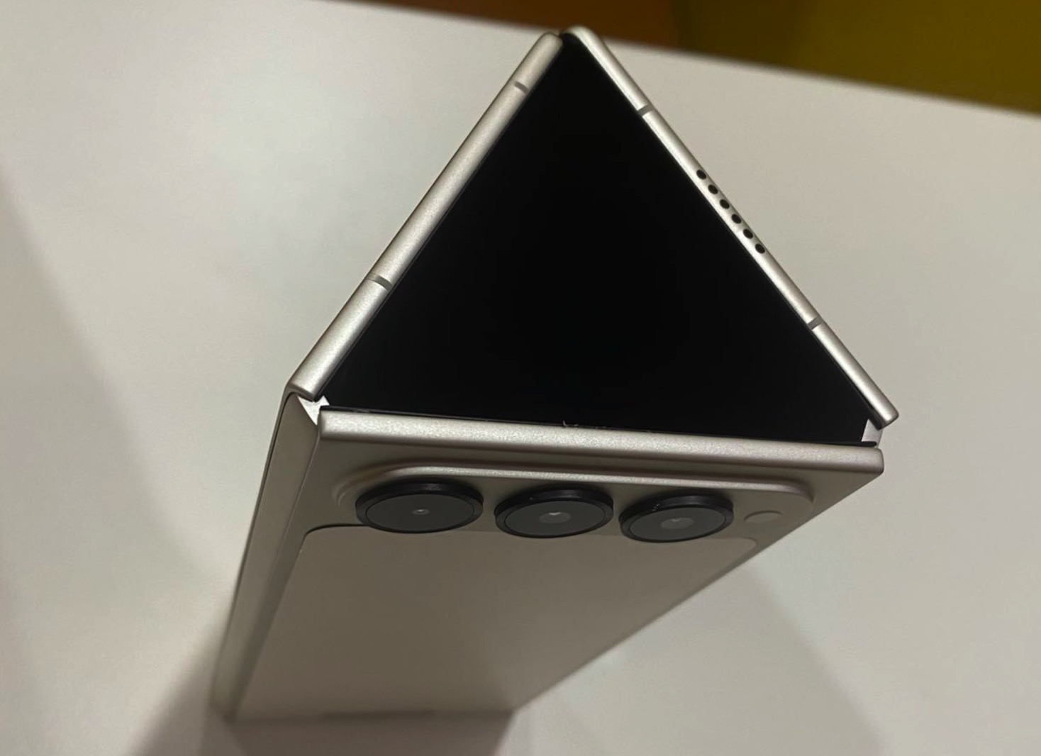 Tecno Phantom Ultimate G Fold trifold standing vertically on a desk.