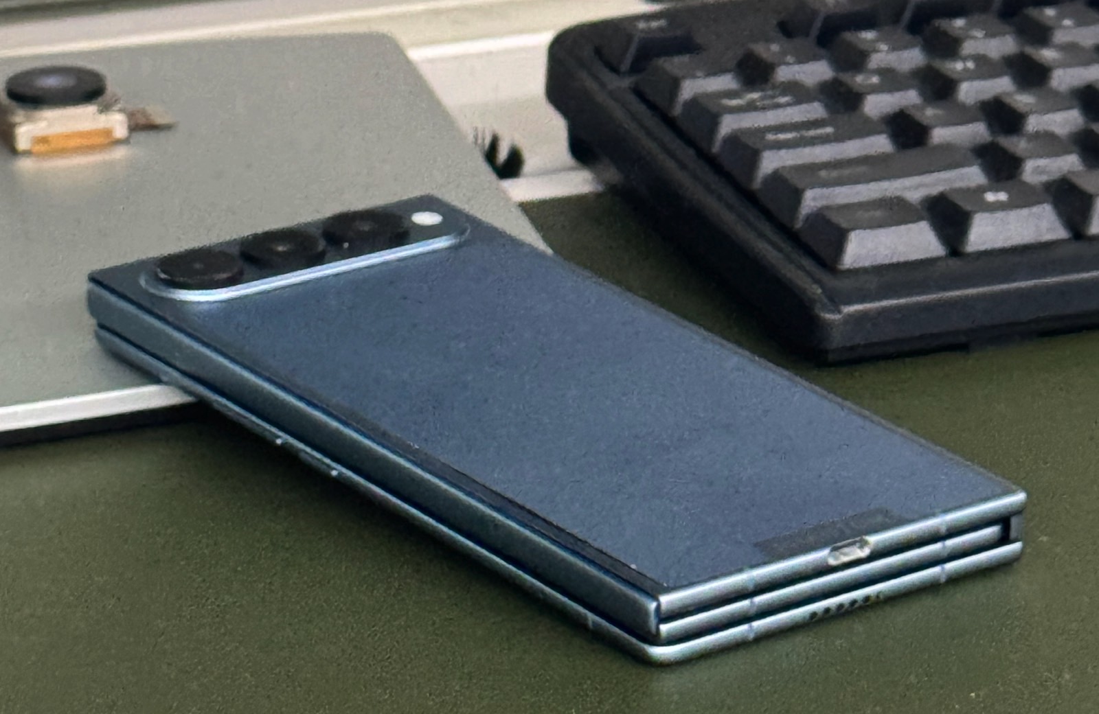 Tecno Phantom Ultimate G Fold trifold folded on a table.